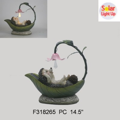 polyresin Garden decor Hedgehog relax in bed with solar